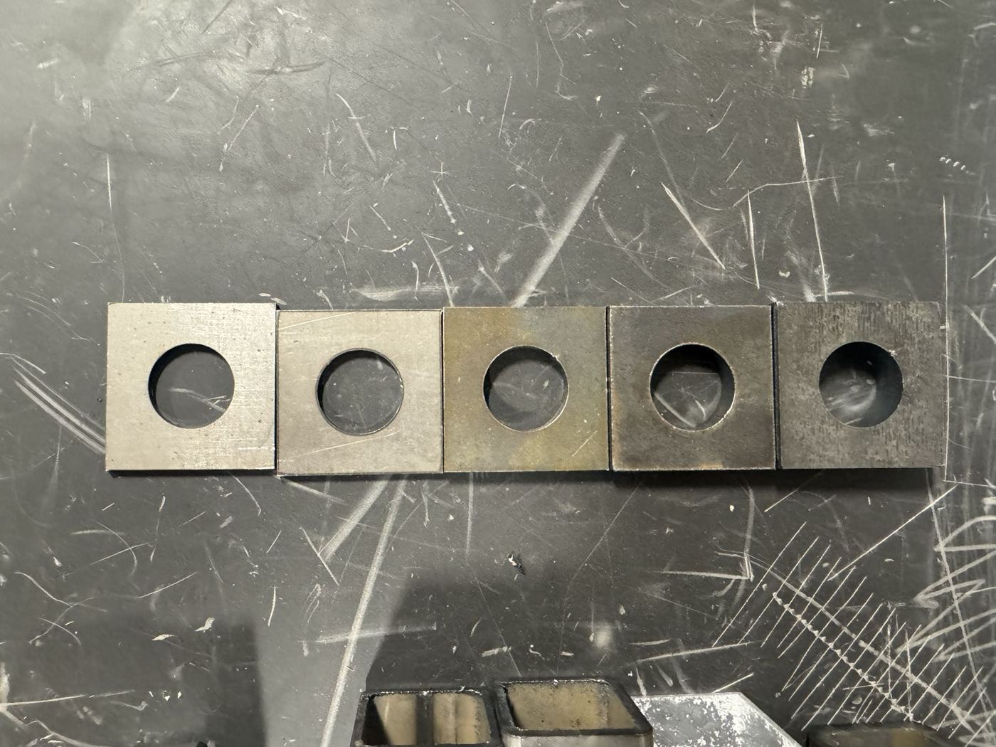 Laser-cut steel plates in a range of thicknesses